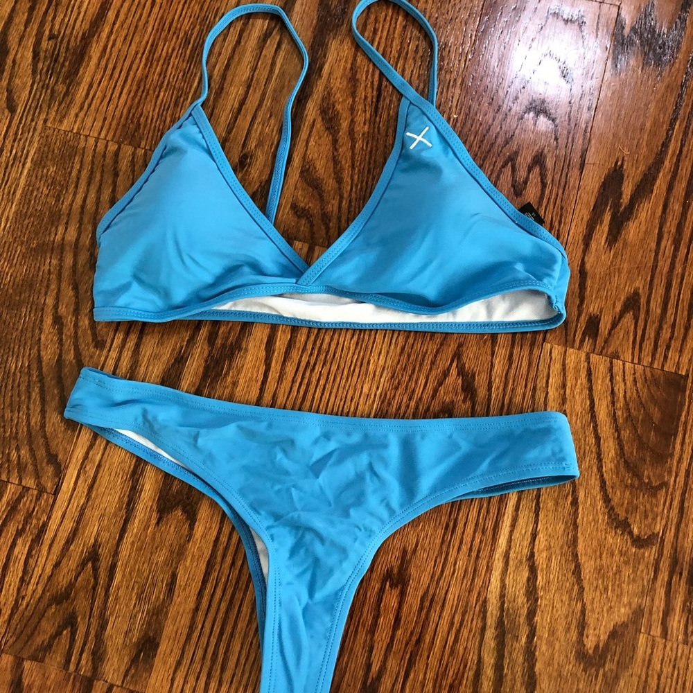 Never worn boutinela bikini sky blue size large